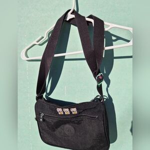 Black Crossbody Bag with Embroidered Details